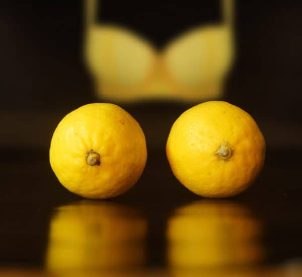 lemon-yellow-bra-background-nipple-clamps-representation
