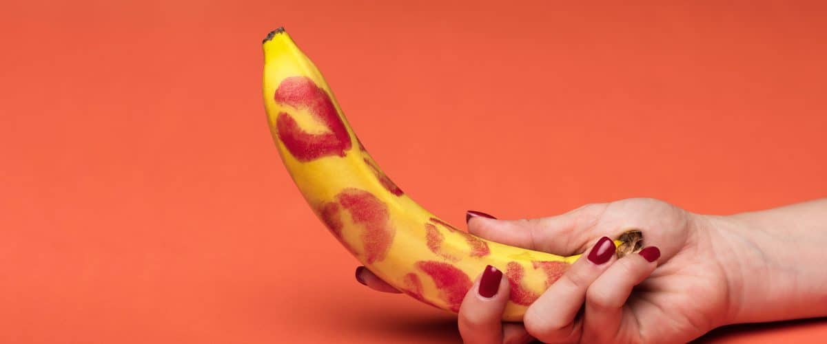 banana-kiss-marks-red-background